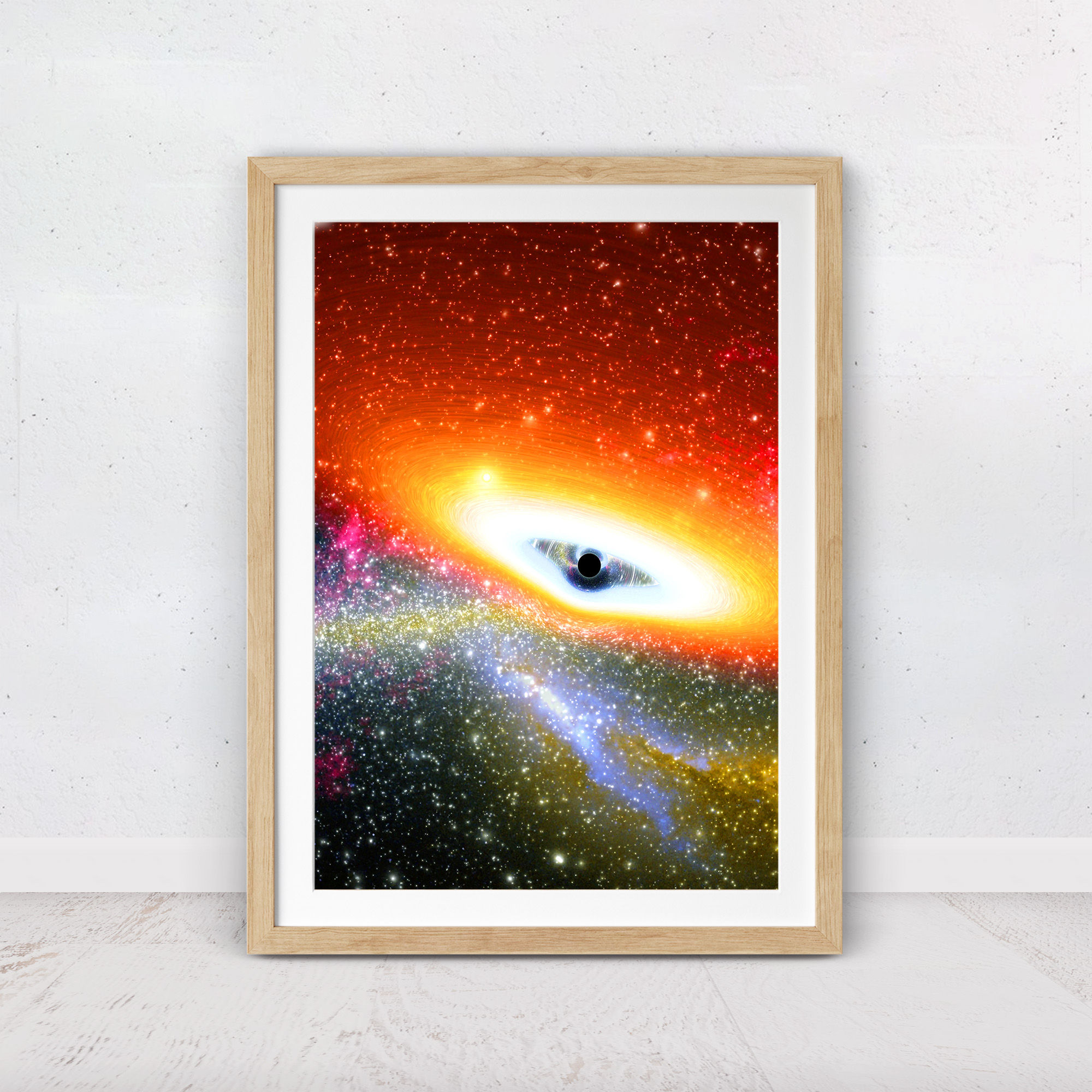 Space wall art featuring a black hole and colorful stars