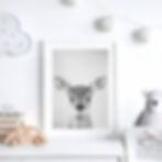 Adorable black and white depiction of a baby deer, great for enhancing nursery decor with a woodlands animals theme.