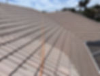 Clean brown tile roof in our gallery of work.