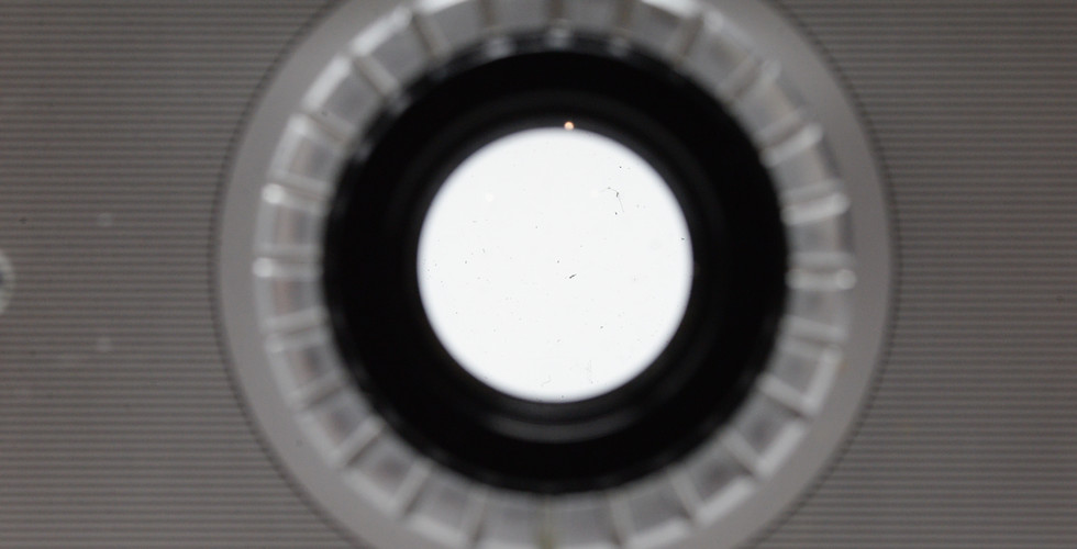 Elements of a Polaroid Land Camera Model 150 Lens 130mm f/8.8