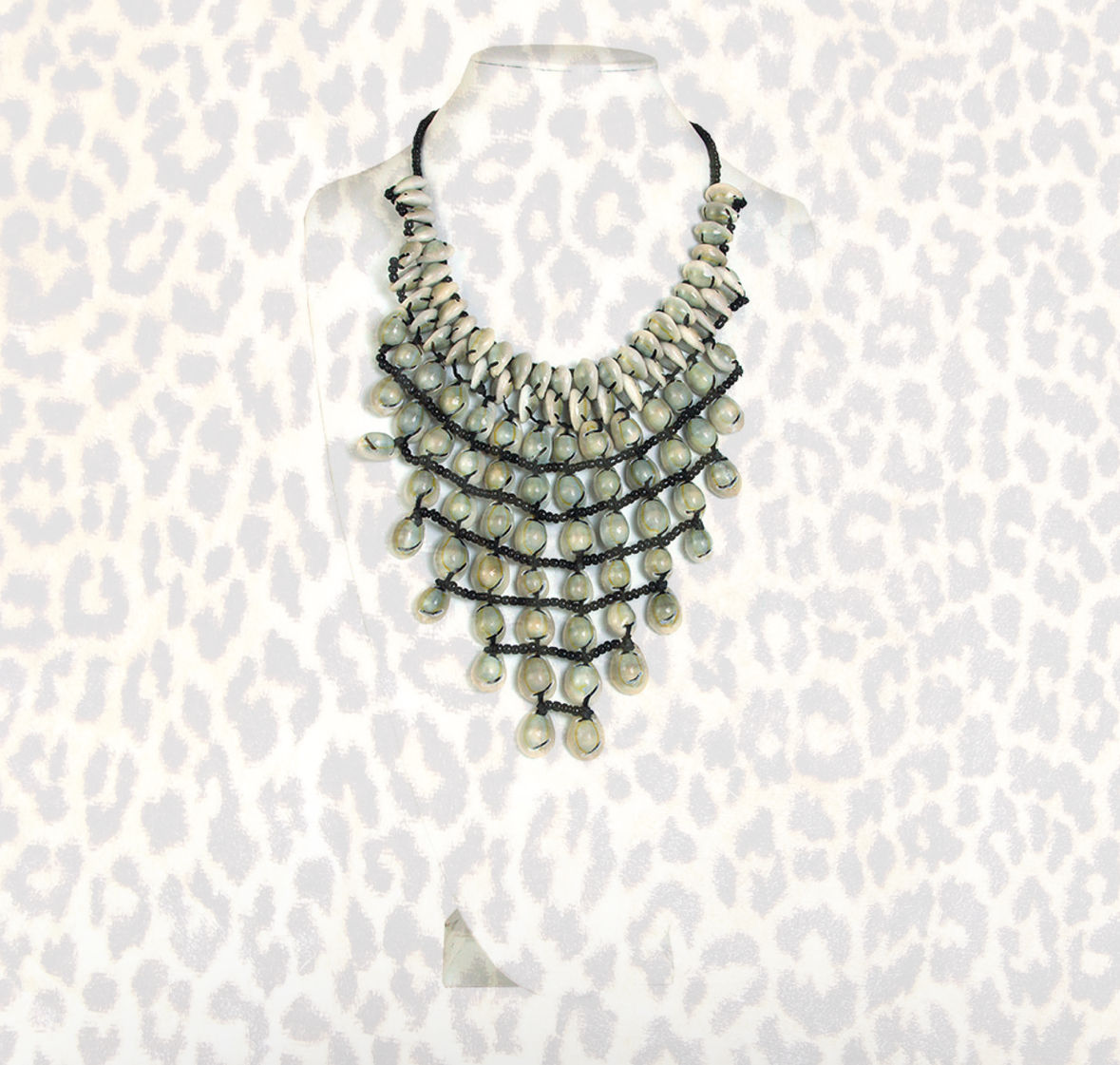 About 9-Row Uncut Cowrie Shell Elegance Necklace
