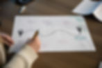 person working on a plan