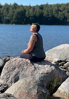 Sitting on rock.heif