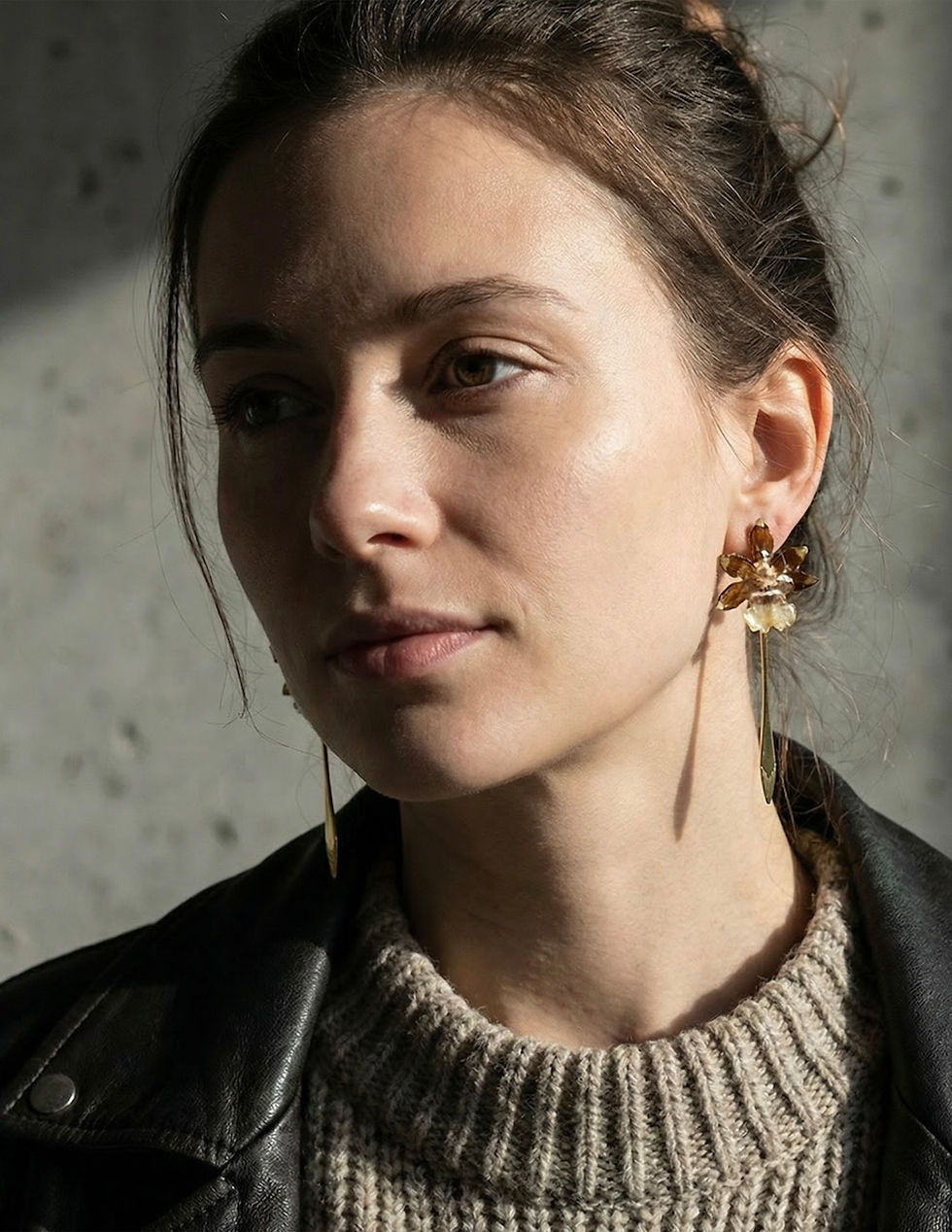 street style leather jacket girl wears casual orchid earrings dangling, persian designer, made in vancouver canada, canadian