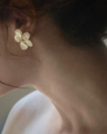 handmade real white flower studs made by Canadian designer based in vancouver, lakoodesigns.