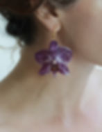 purple Phalaenopsis earrings coated in resion made by local canadian artist jewelry designer LakooDesigns in Vancouver.