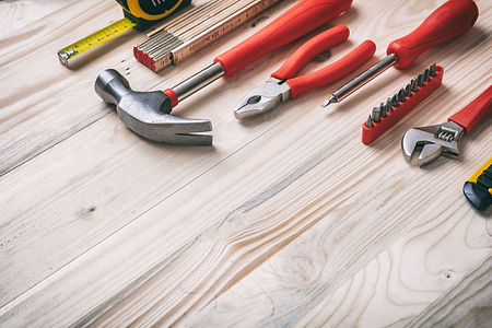 hand-tools-set-on-wooden-table-copy-spac