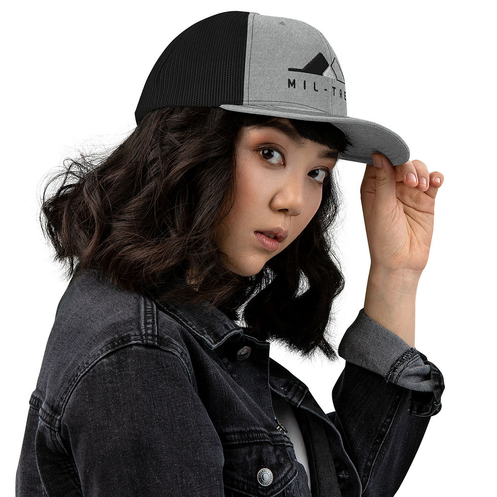 Thumbnail: embroidered trucker cap side view on female model