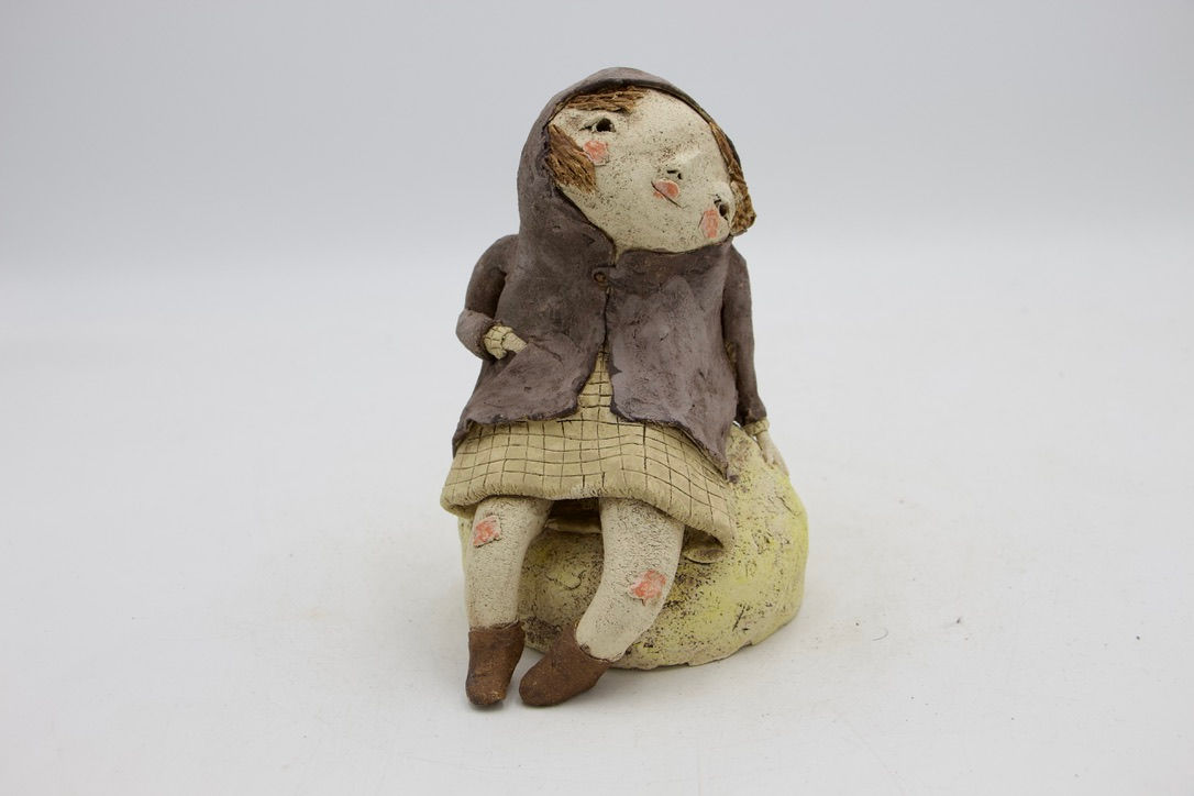 joues et genoux rougis sur le chemin de la vie