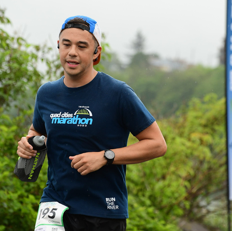 Photo of Tanner, the creator of Runners Gear Guide running during a marathon in Washington