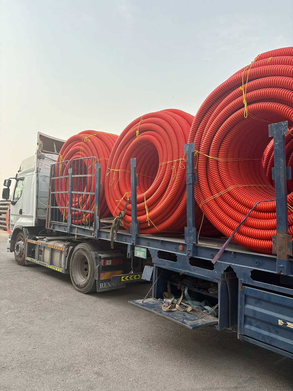 COD pipes being loaded onto trailer for delivery to project site in Saudi Arabia