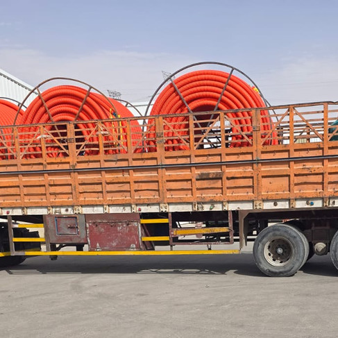COD pipes being loaded onto trailer for dispatch by Durrahtel Arabic Industry in Saudi Arabia for telecom and underground cable projects