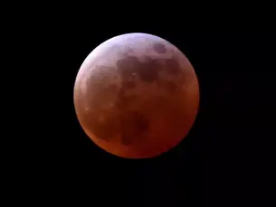 Rare blood moon visible across parts of Australia tonight