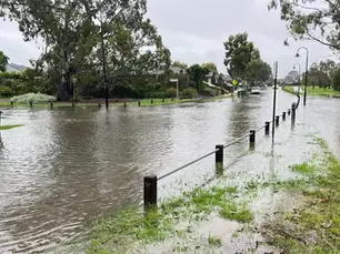 Flood warnings issued across half of Australia as tropical low drenches regions