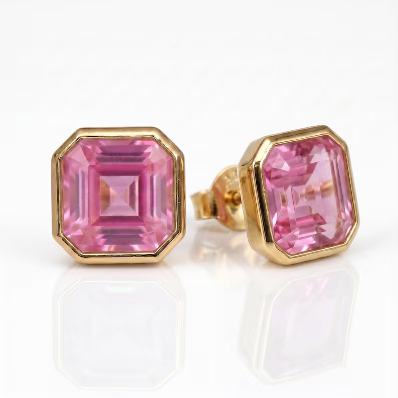 Thumbnail: Solitaire Asscher Cut Pink Sapphire Bezel Set Stud Earrings Solid 14kYellow Gold