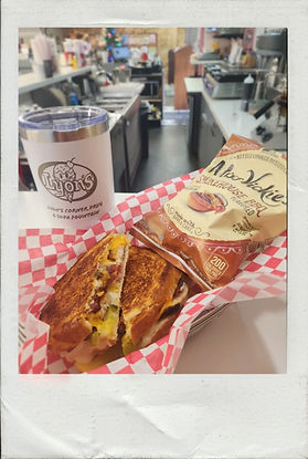 Ask about our Lyon's tumbler!   Santa Fe Melt with turkey, hatch green chiles, jalapenos, avocado, bacon and chipotle aioli melted with jack cheese, paired with chips and a pickle!