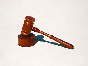 A gavel on a white background