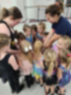 Star Leader, Adult Staff Member, Group of smiling students