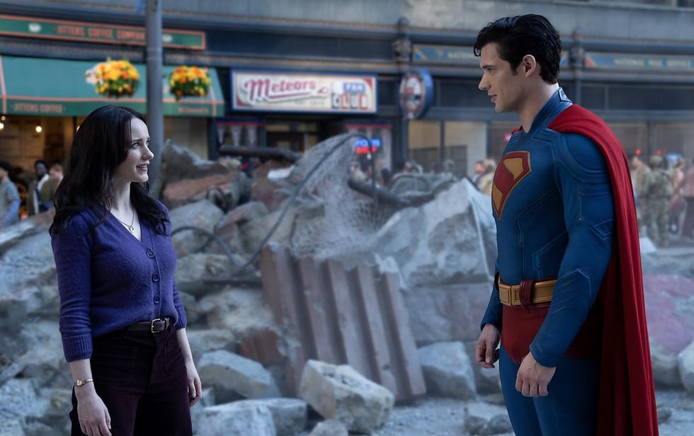 Lois Lane & Superman stand in the rubble of Metropolis.