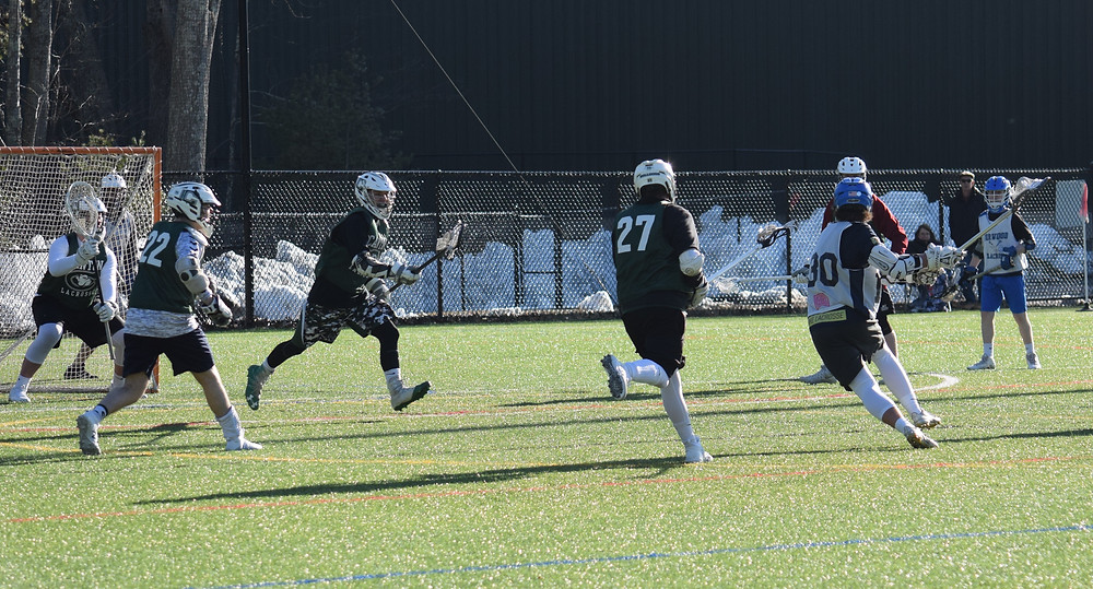 Norwood's Jake Smelstor fires a shot on net during Norwood's scrimmage against the Canton Bulldogs