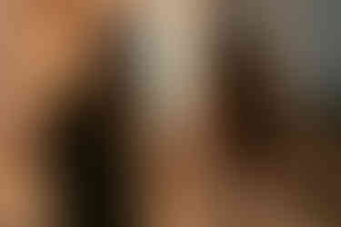 bride and groom speech with brides hand on grooms back