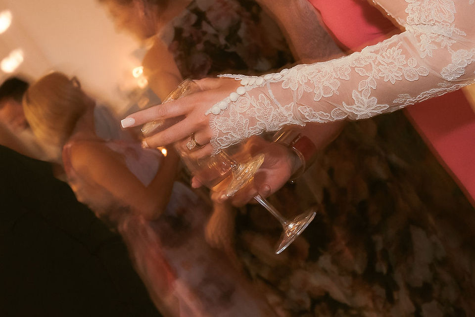bride holding wine glass
