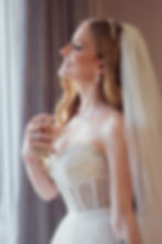 Ellie in Budapest wedding photography applying perfume.