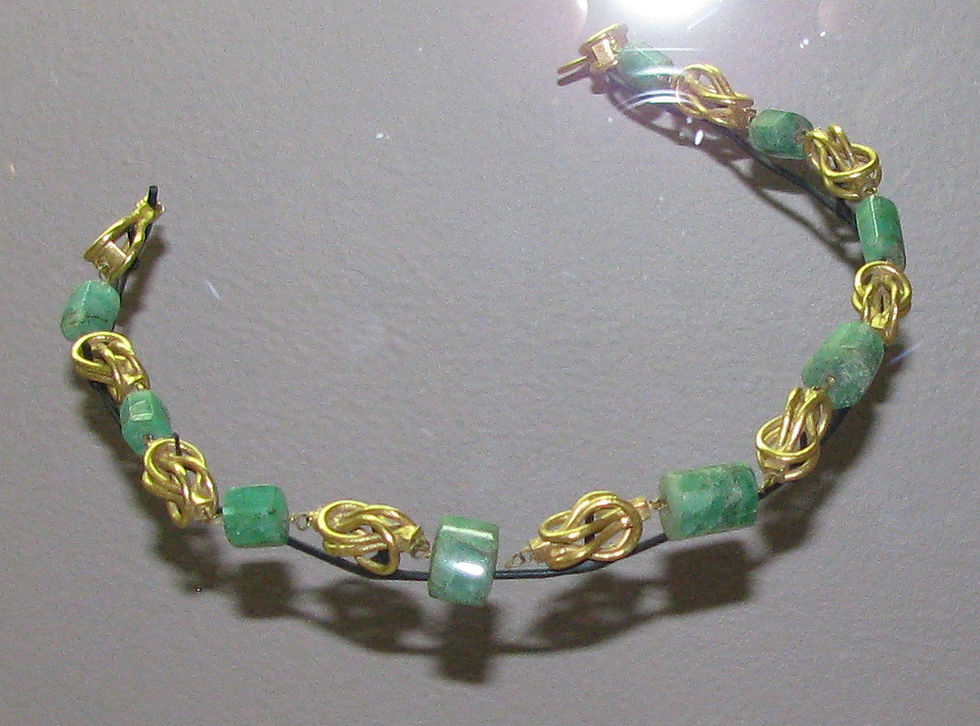 Necklaces with the Knot of Heracles. Wikimedia Commons license