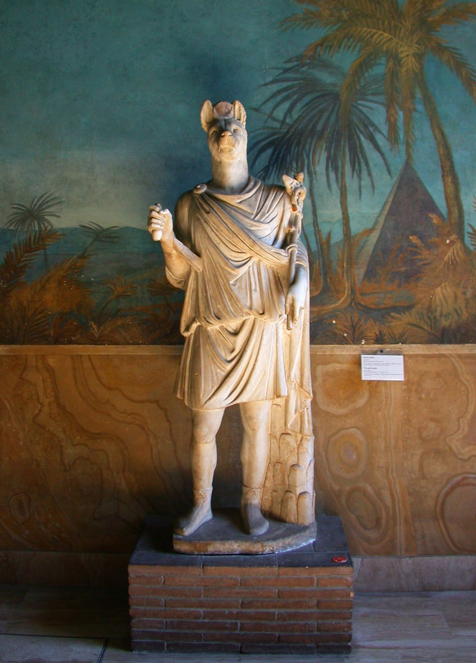 Statue of Hermanubis, a Greco-Egyptian fusion of the gods Hermes (caduceus) and Anubis (jackal head).