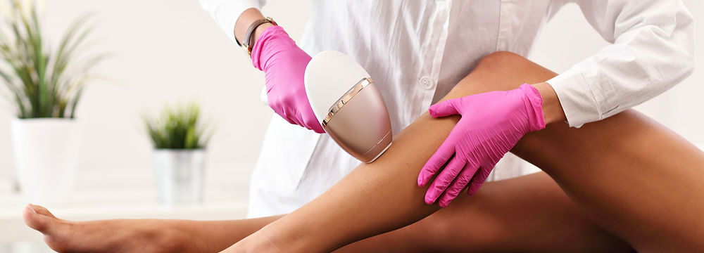 Client undergoing laser treatment for long‑term hair reduction