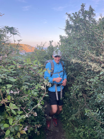 Hiking through gorse bushes on the SWCP