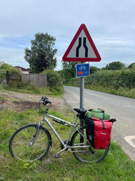 Bike next to NCN sign
