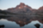 reflection on Thousand Island Lake of sunrise over Banner Peak, Ansel Adams Wilderness California