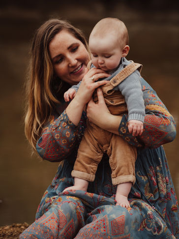 mother and son outdoor river earthy feeling
