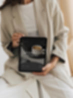 LOW-The-launch-club-Woman-holding-ipad--template-The-Confident-and-chic.jpg