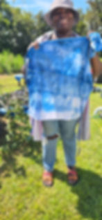 Akymia Hunter with her indigo dyed apron