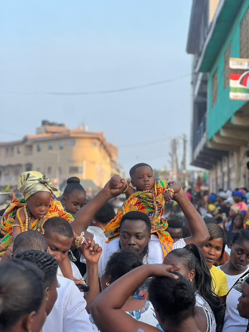 Celebrating the spiritual arrival of twins, a symbol of doubled presence and connection to nature's forces, within a vibrant gathering.
