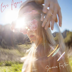 Cover art for Love Again by Serena Foster showing a dreamy sun-flared portrait of a woman with flowers covering her eyes while a hand reaches toward her, set outdoors with soft light and lens effects.