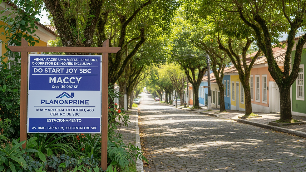Rua tranquila com casas e árvores no Jardim do Mar