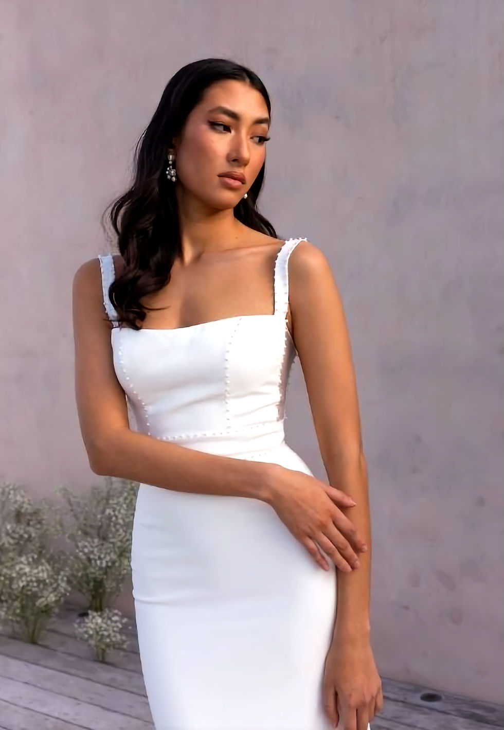 Thumbnail: Simple square bodice with tiny pearl details on fitted wedding dress