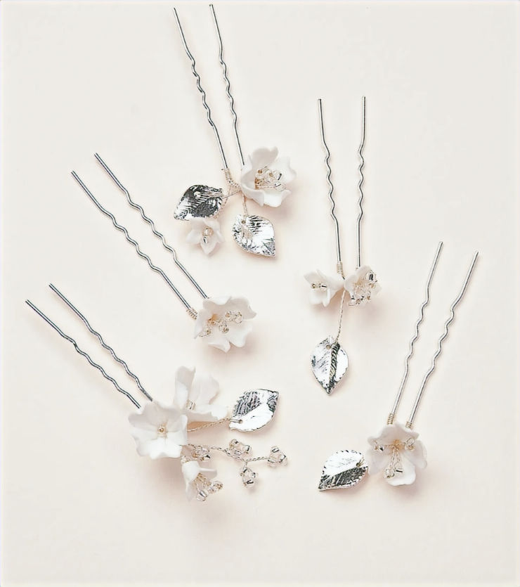 Bridal Hair pins a mix of ivory ceramic flowers