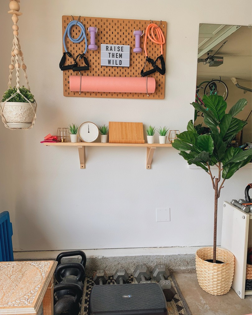 boho home gym with plants and cute decor