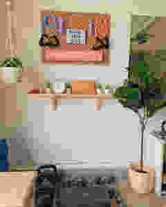 boho home gym with plants and cute decor