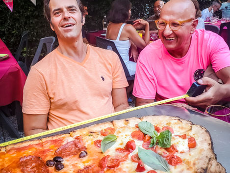 Pizza by the Meter and the Airbnb in a Church, in Pisa, Italy