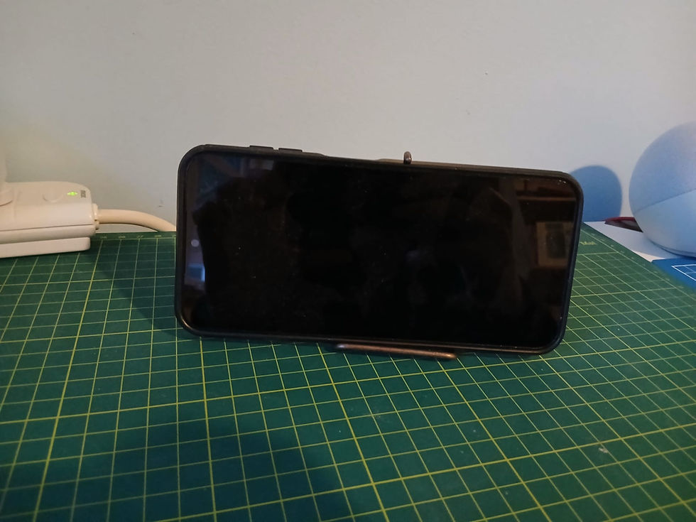 Phone stand with phone (front)