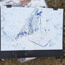 Artist sketching a detailed outdoor scene on paper with a tripod Portfolio