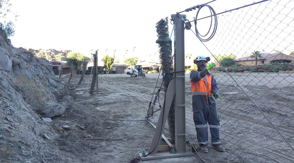 rockfall barrier installation above road