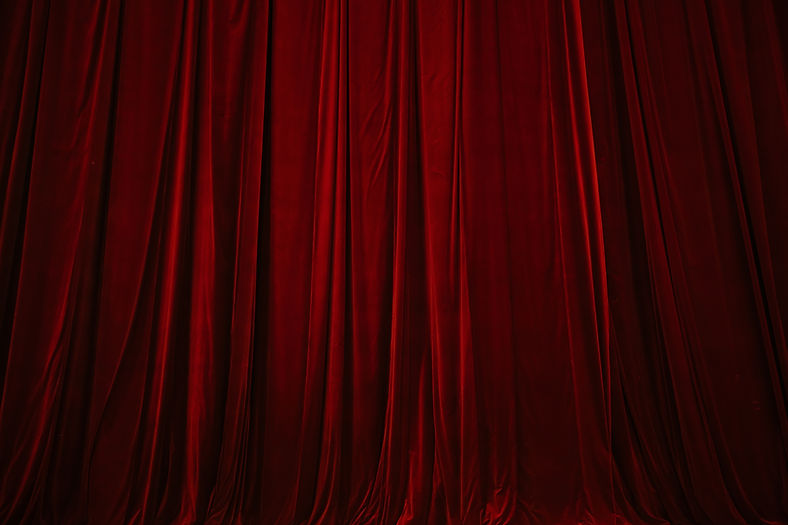Red curtain in theatre background for design purpose.jpg
