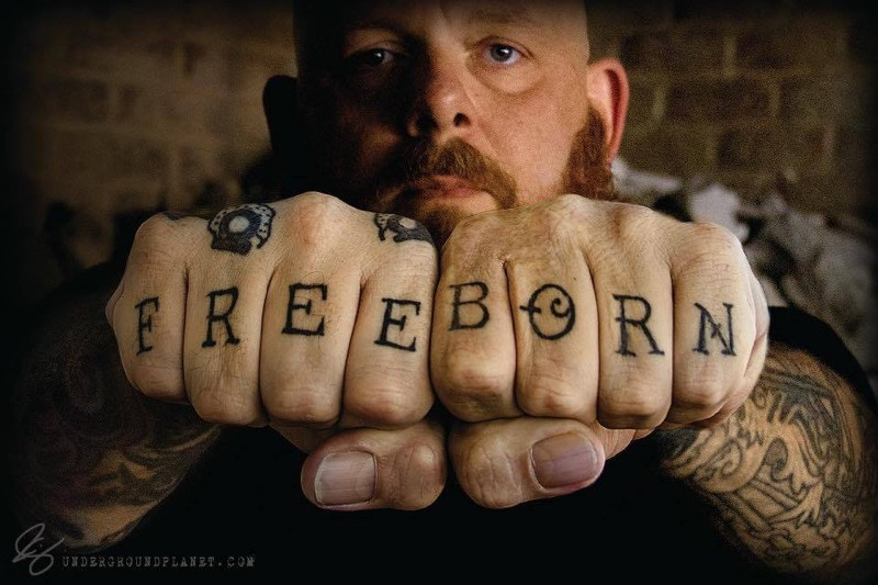 Brandon Jenkins - Free born fist tattoo