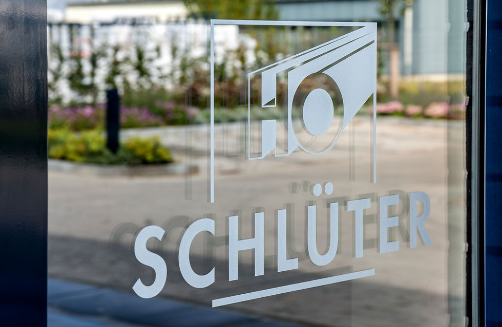 A close up of the entrance doors at H.O. Schlüter head office